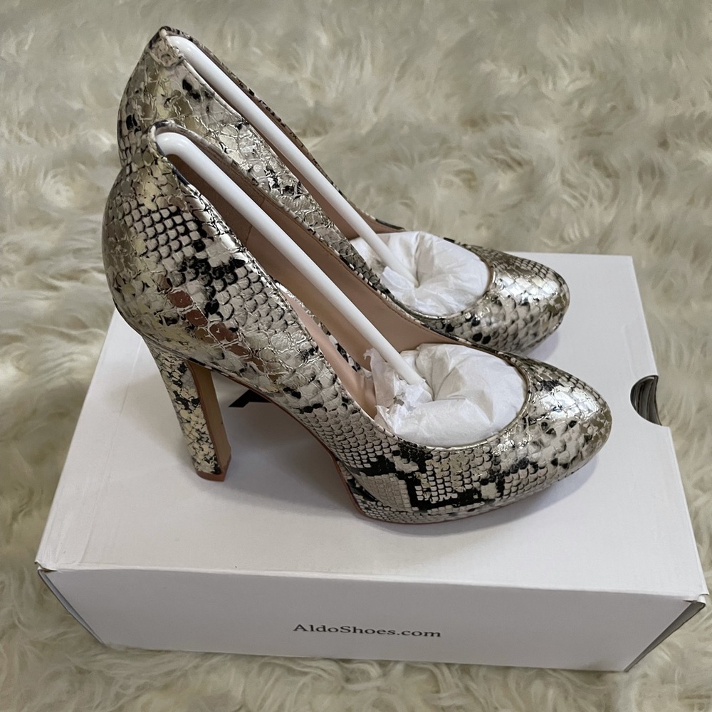 Aldo Edaressa faux snakeskin pumps.